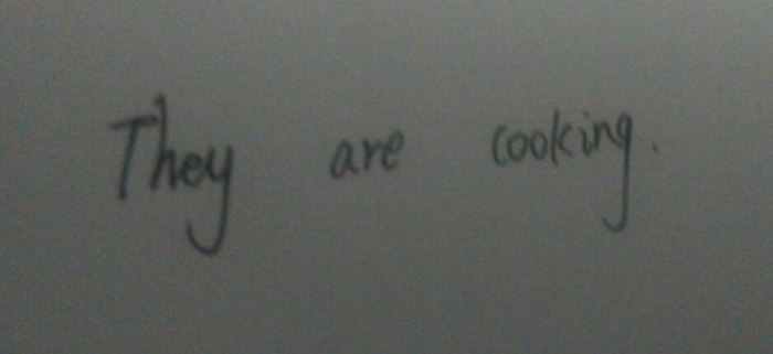 他们在做饭,用英语怎么写?